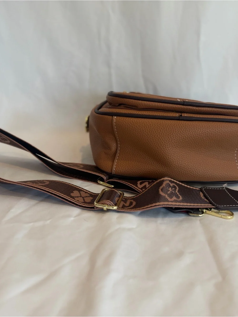 K-Emblem Tan Pebbled Leather Crossbody Bag with Patterned Strap